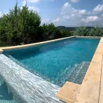 Pool resurfacing and renovation - epoxy finishes and concrete deck coating